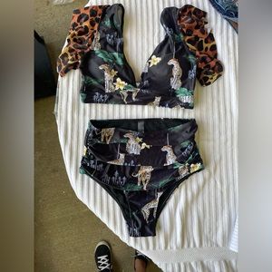 NWT. 2 pc swim suit. Animal print